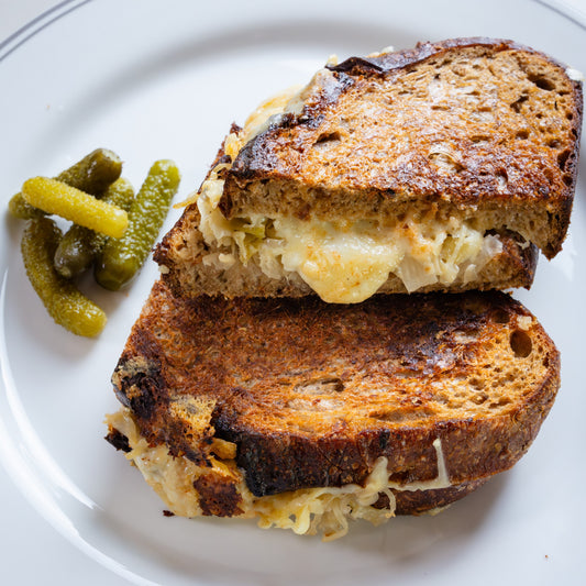 heese toastie with sourdough, melted cheddar and mozzarella, sauerkraut and chipotle sauce.