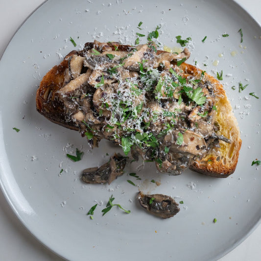 ltimate mushrooms on toast with red onions, garlic, Salsa Porcini, sourdough and parmesan.