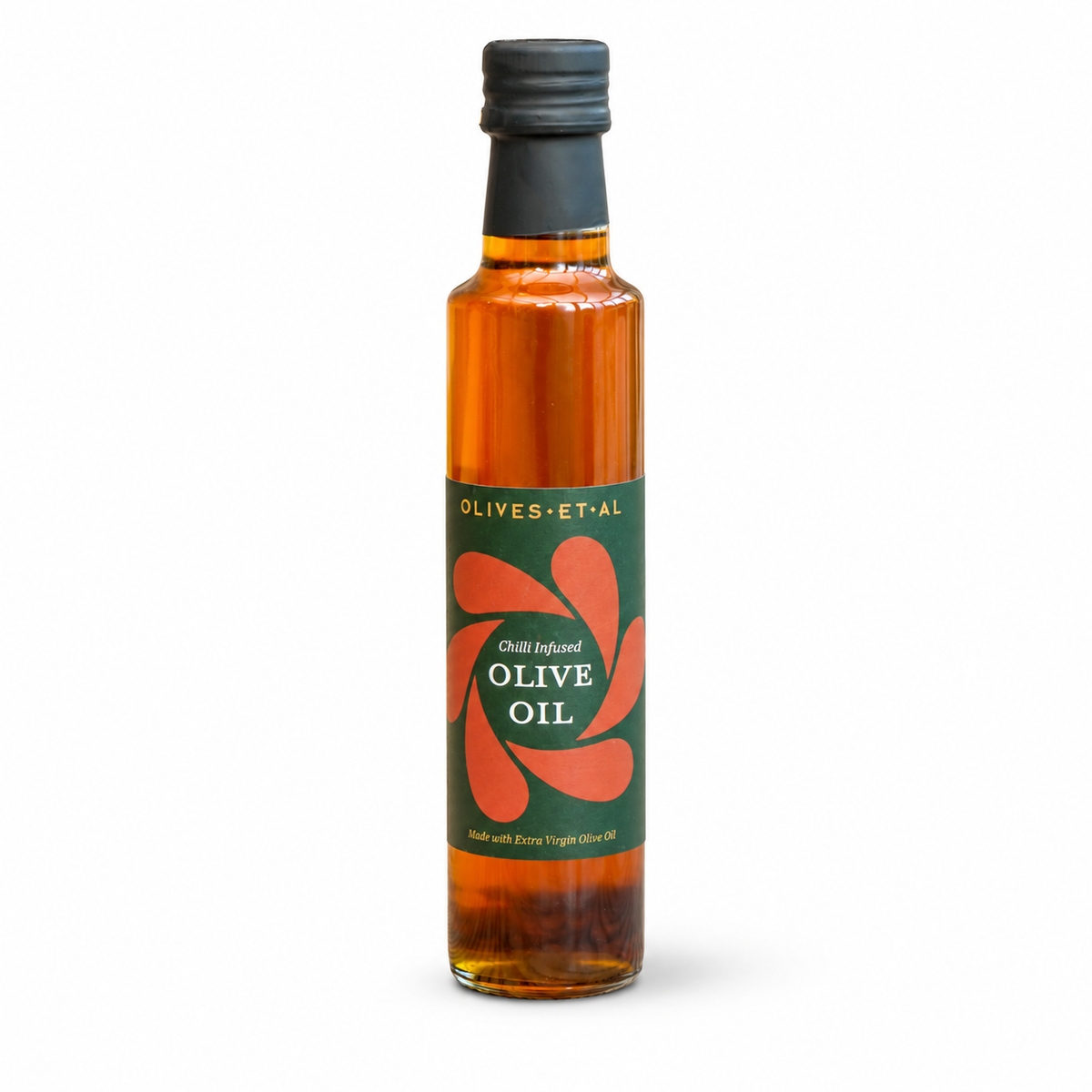 A bottle of Olives+Etal chili-infused olive oil, featuring a dark green label with a red flower design and a black cap, set against a plain white background.