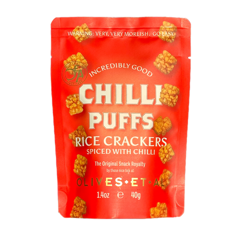 Red package of Chilli Puffs rice crackers with visible branding on a white background