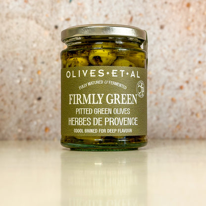 Firmly Green Pitted Olives with Herbes de Provence.
