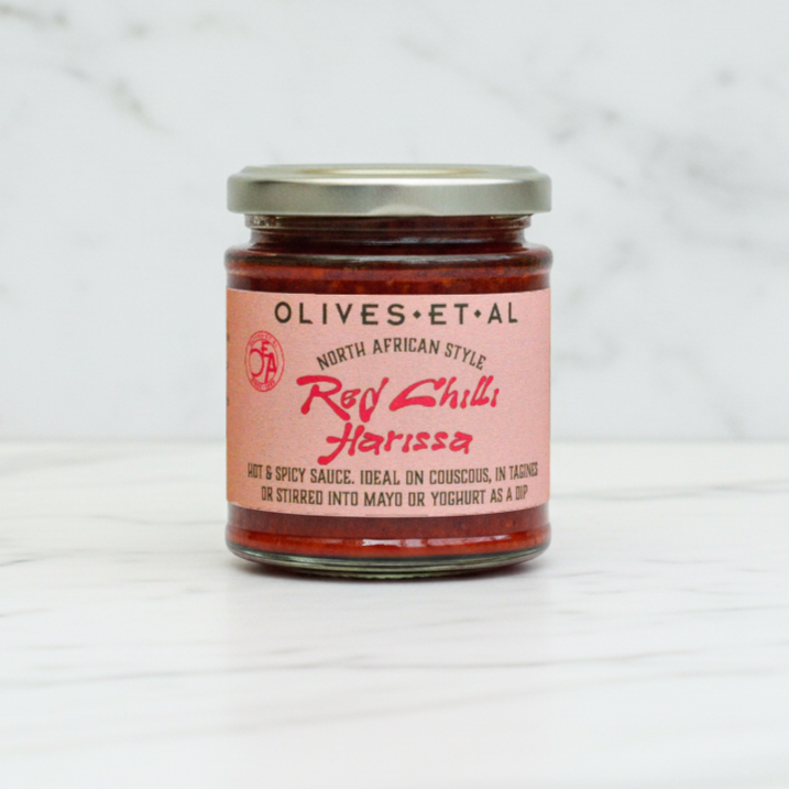 Red Chilli Harissa On White Marble background