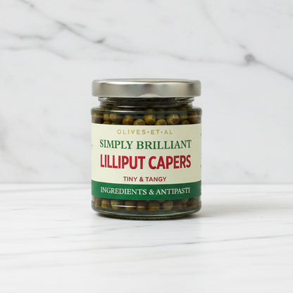Jar of Simply Brilliant Lilliput Capers on a white background