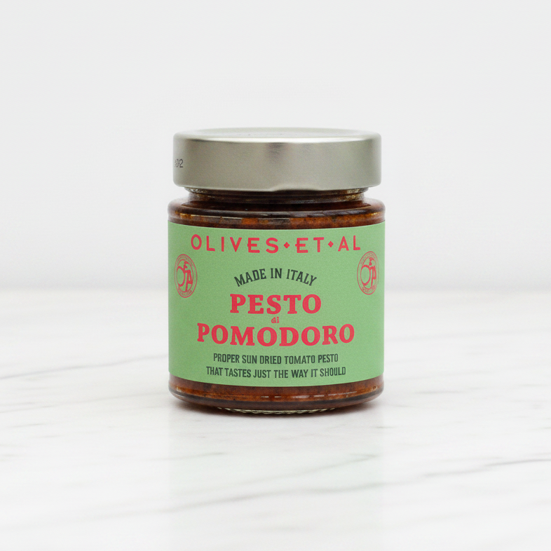 Jar of Olives et al Pesto Pomodoro on a white background