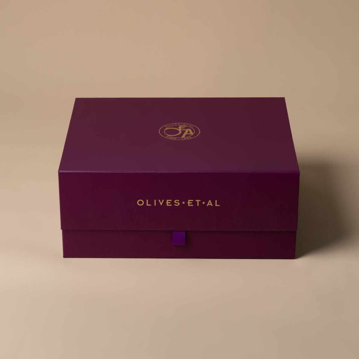 Small purple Olives Et Al gift hamper box and ribbon detail