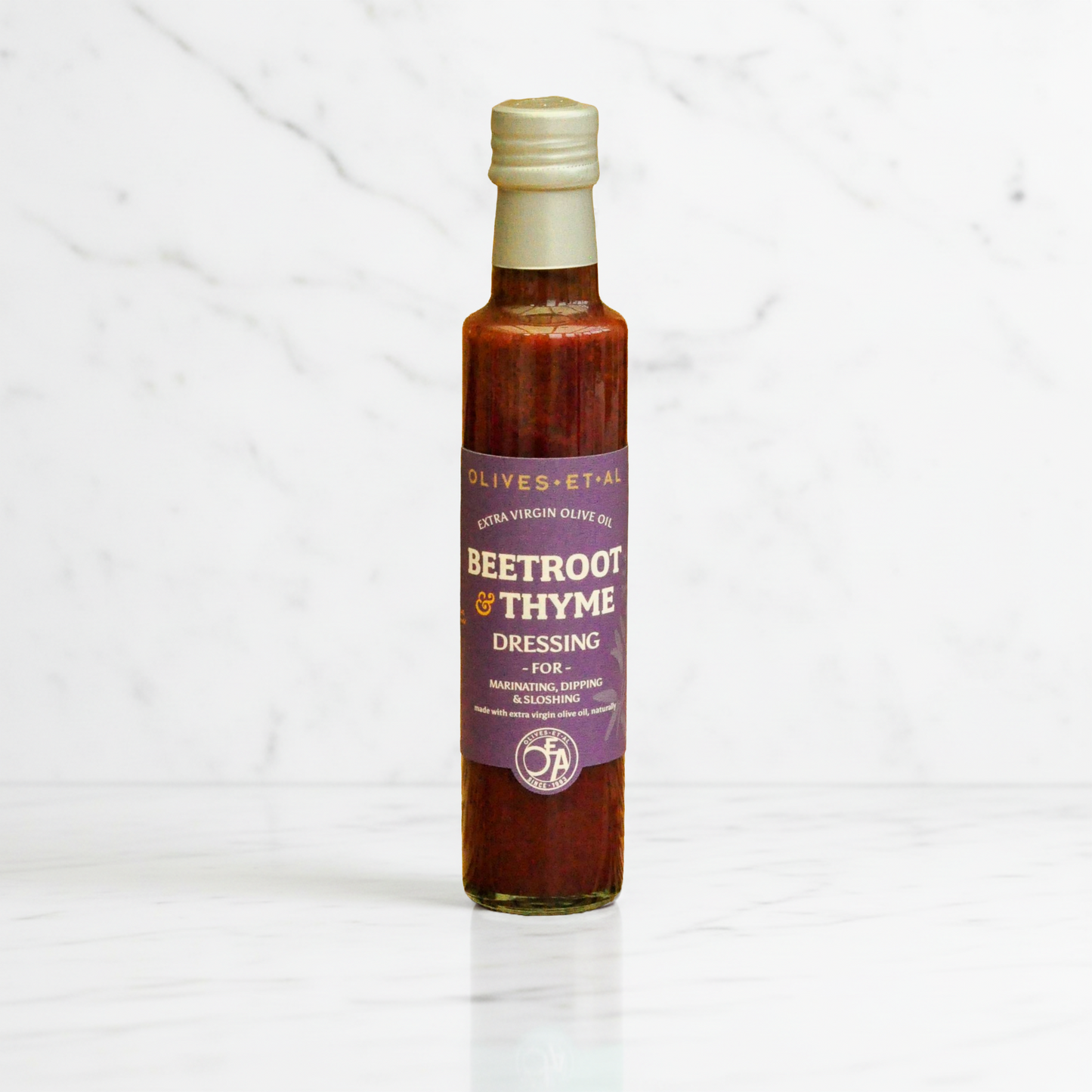 Bestselling beetroot and thyme dressing made with 100% extra virgin olive oil, UK-made no seed oil salad dressing in glass bottle