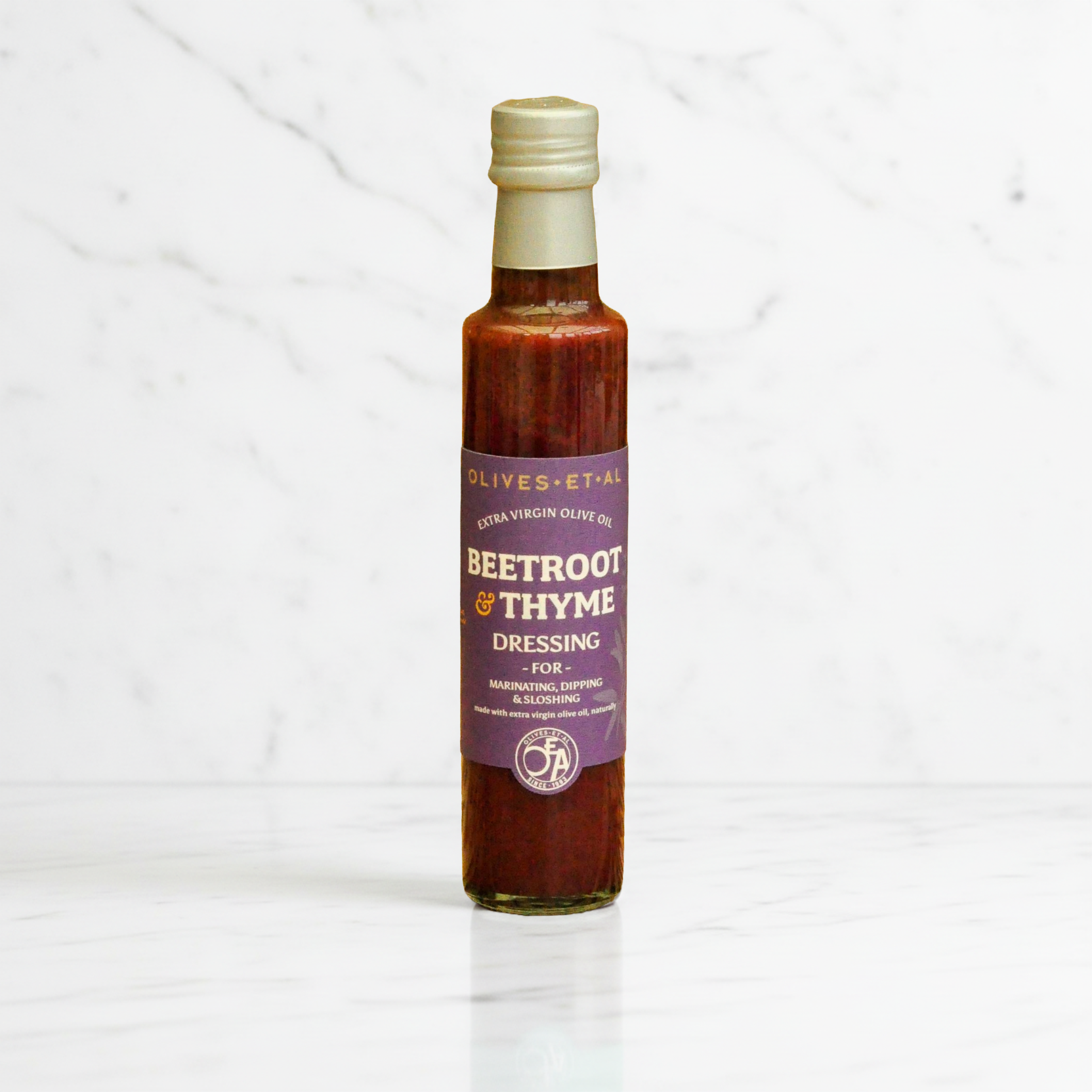 Bestselling beetroot and thyme dressing made with 100% extra virgin olive oil, UK-made no seed oil salad dressing in glass bottle