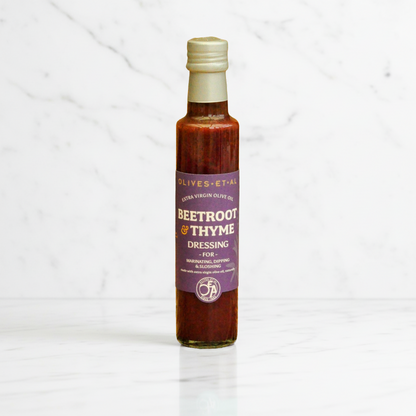 Bestselling beetroot and thyme dressing made with 100% extra virgin olive oil, UK-made no seed oil salad dressing in glass bottle