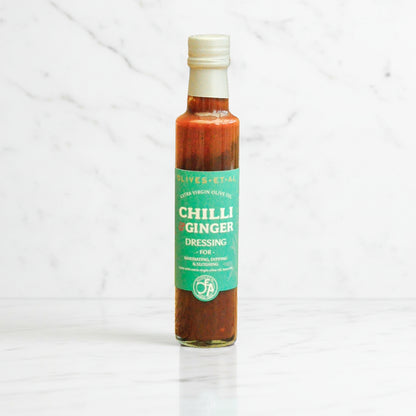 Bottle of Chilli Ginger dressing on a white background