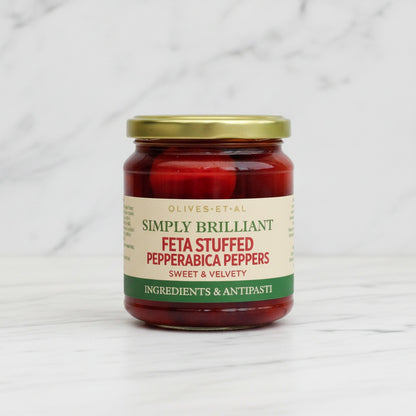 Jar of 'Simply Brilliant Feta Stuffed Peperoncini Peppers' on a white background