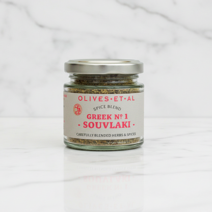 greek souvlaki kebab spice blend on white marble backdrop