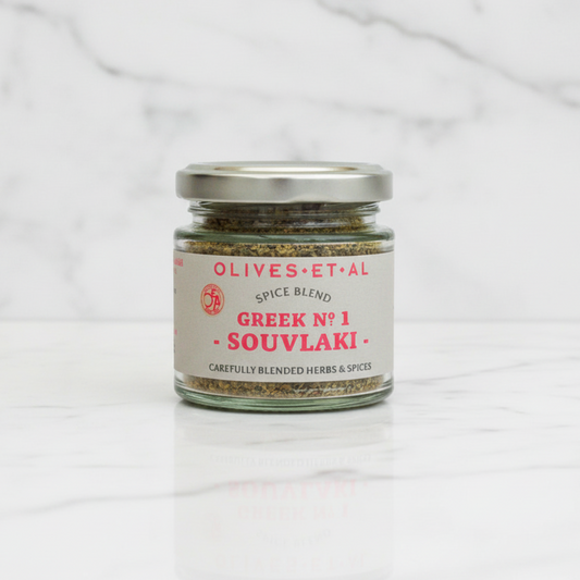 greek souvlaki kebab spice blend on white marble backdrop