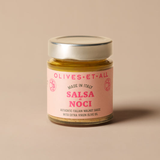 Olives Et Al Salsa di Noci Italian Walnut Sauce in a 135g glass jar, filled with a smooth, creamy blend of walnuts, cashews, extra virgin olive oil, Parmesan cheese, garlic and marjoram. Its rich, nutty flavour makes a thoughtful Christmas stocking filler or gourmet food hamper addition. Perfect for festive entertaining, stir into pasta or gnocchi, spoon over roasted winter vegetables, or spread onto warm bread for Christmas party nibbles. A delicious Italian treat for food lovers to enjoy over the holidays