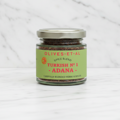 adana kebab spice blend on white marble background