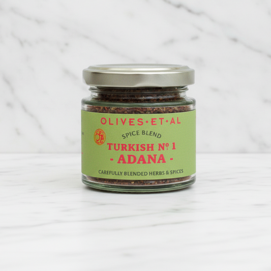 adana kebab spice blend on white marble background